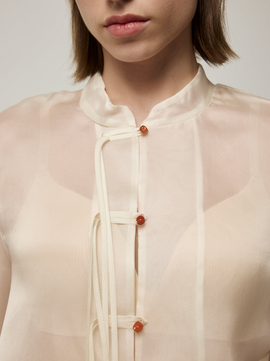 Sheer Silk Blouse with Fringe Buttons and White Floral Jeans Set